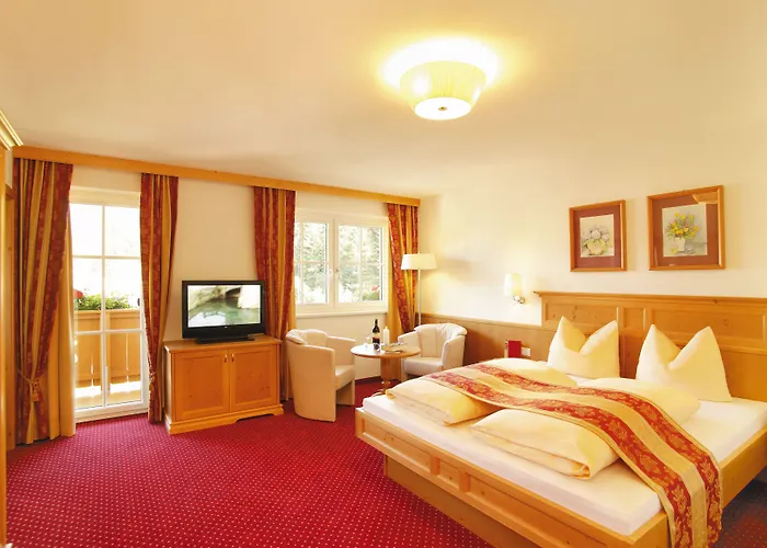 Alpenherz Garni Hotel 4*